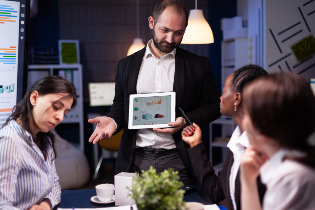 Entrepreneurial man presents strategies for obtaining leads