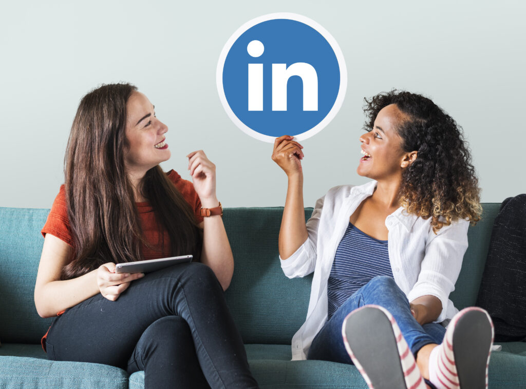 Two women with a LinkedIn logo.