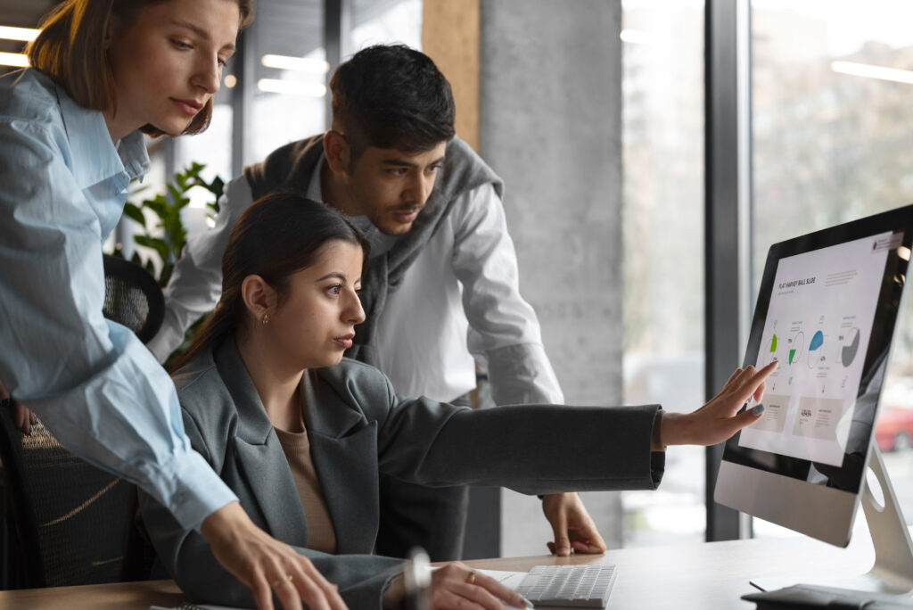 Group of people analyzing the SaaS regulations 2025