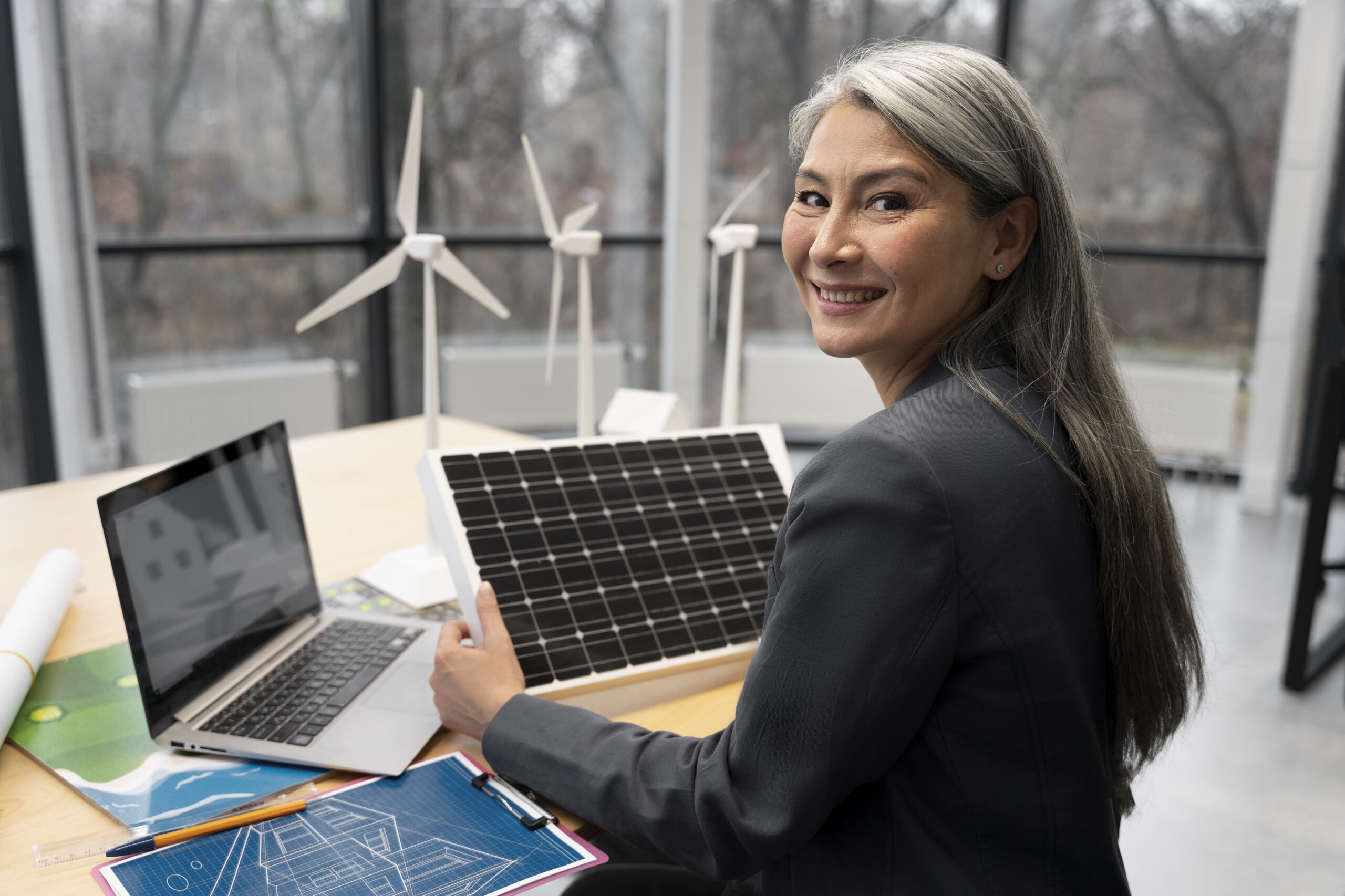 A business woman checks on the Solar energy in Latin America