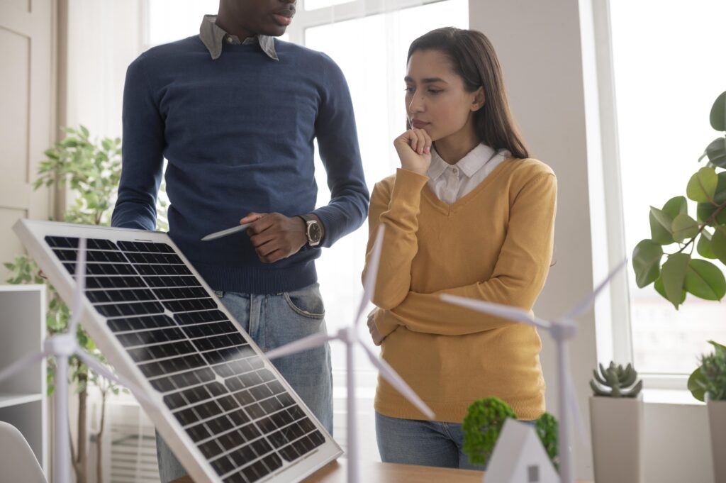 Coworkers analyze the challenges of renewable energy internationalization