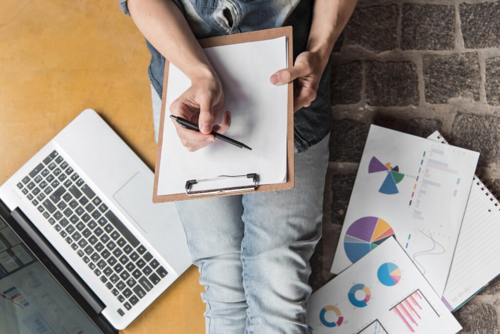 Business professional planning and analyzing data for outbound energy campaigns.