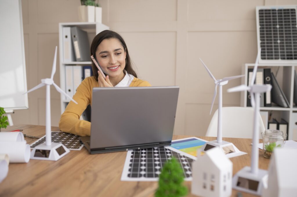 A woman works on a energy business expansion